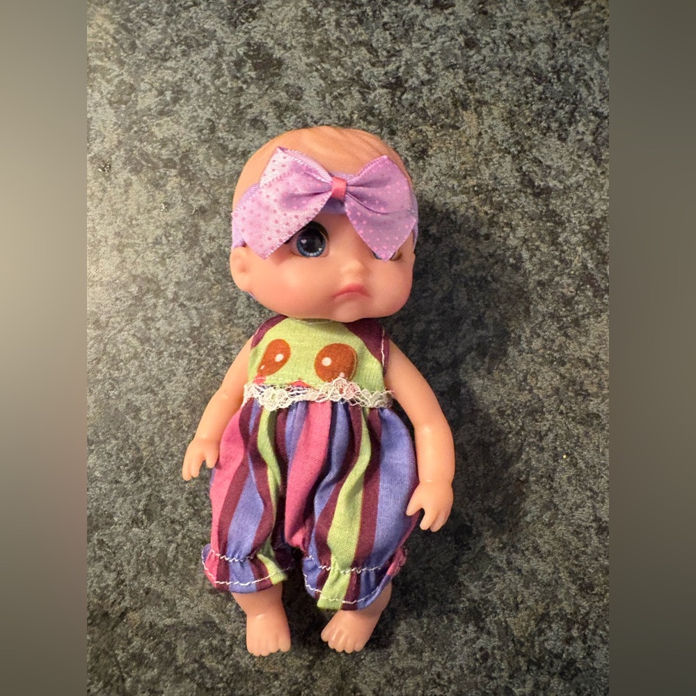 Striped Baby Doll with Purple Bow